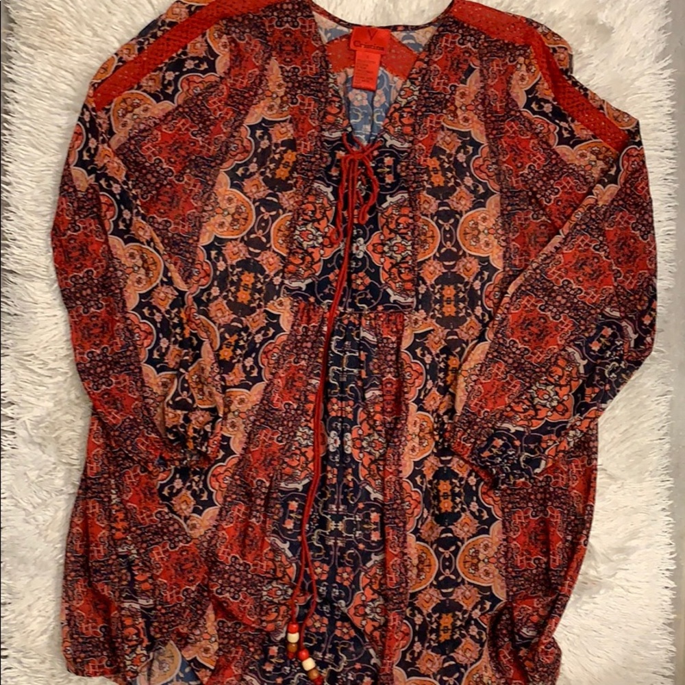 Tunic. SizeS. Sheer. Elastic at wrist.